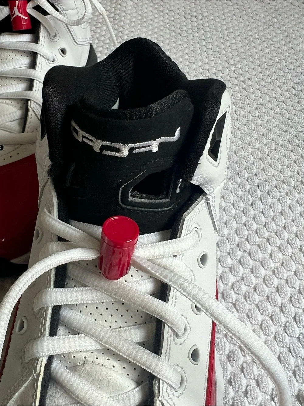 NWOT Nike Air Jordan Kids White and Red Patent Toe Sneakers